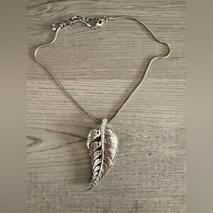 Elegant Silver Leaf Pendant Necklace with zirconia stones